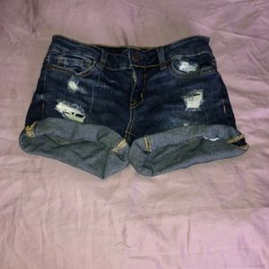 Dark wash denim shorts with rips
